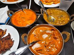 Dada Indian Cuisine signature dishes Chicken CurryLamb BiryaniPalak Paneer